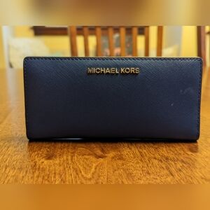 Gently used. Michael Kors Wallet. Navy Blue.